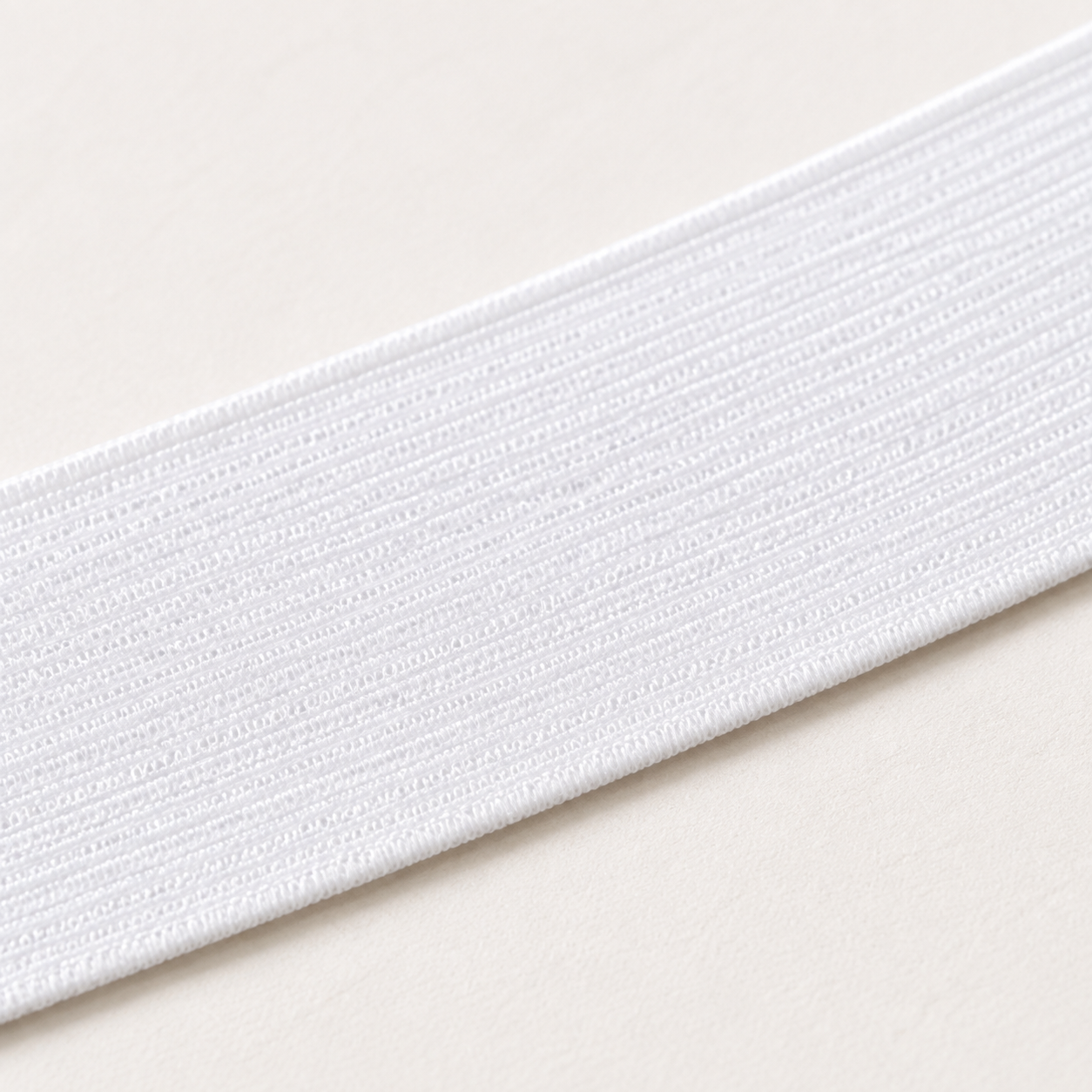 25mm bleached white elastic, macro view