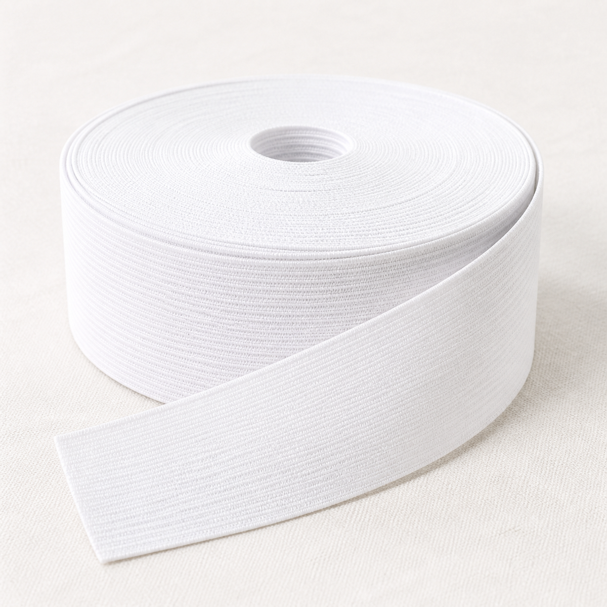 25mm bleached white elastic on a roll
