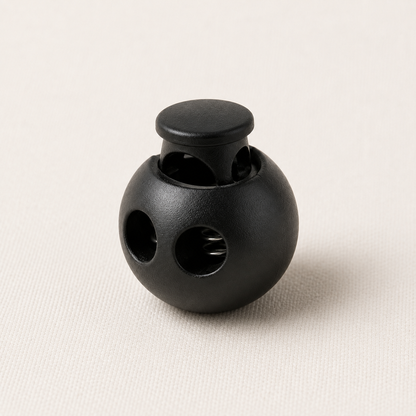 bomb shaped black cord stopper, hero view